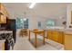 Kitchen showcases a light-filled breakfast nook and ample counter space at 244 Sweet Bay Pl, Carrboro, NC 27510
