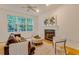 Bright living room featuring natural light, fireplace, comfortable seating and hardwood floors at 244 Sweet Bay Pl, Carrboro, NC 27510