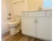Bathroom features a toilet, bathtub, and a vanity with a mirror at 28 Carteret Ct, Clayton, NC 27527