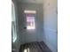 Foyer with wood flooring, natural light, and decorative molding at 28 Carteret Ct, Clayton, NC 27527