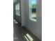 Hallway featuring white walls, natural light, wood floor, and decorative molding at 28 Carteret Ct, Clayton, NC 27527