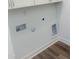 Bright laundry room with connections for a washer and dryer at 28 Carteret Ct, Clayton, NC 27527