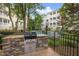 Outdoor grilling station with stone accents, perfect for community gatherings near the pool at 2813 Market Bridge Ln # 104, Raleigh, NC 27608