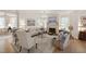 Stylish living room boasts a fireplace, chandelier lighting, and comfortable seating area at 2813 Market Bridge Ln # 104, Raleigh, NC 27608