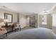 Elegant building lobby with seating, a mirror, and access to elevators at 2813 Market Bridge Ln # 104, Raleigh, NC 27608