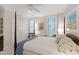 Bright main bedroom with classic decor, plantation shutters, and a ceiling fan at 2813 Market Bridge Ln # 104, Raleigh, NC 27608