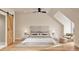 Cozy bedroom with neutral tones, a ceiling fan, wood flooring and a comfortable chair at 2940 C Chapel Hill Road, Durham, NC 27707