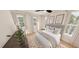 Bright bedroom featuring multiple windows with natural light and neutral decor for a relaxing atmosphere at 2940 C Chapel Hill Road, Durham, NC 27707