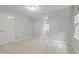 Bedroom features neutral carpet, double door closet, and natural light from a window at 314 Chanticlair Dr, Apex, NC 27502