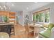 Charming breakfast nook featuring a built-in bench with views of the backyard at 314 Chanticlair Dr, Apex, NC 27502