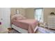 Bedroom featuring a comfortable bed and a view to outside at 3315 Mebane Oaks Rd, Mebane, NC 27302