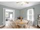 Inviting dining room with wood flooring and lots of natural light at 3315 Mebane Oaks Rd, Mebane, NC 27302