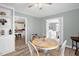 Cozy dining area with views of kitchen and laundry room at 3315 Mebane Oaks Rd, Mebane, NC 27302