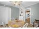 Bright dining area features neutral walls and a view into kitchen at 3315 Mebane Oaks Rd, Mebane, NC 27302