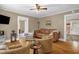 Cozy living room featuring hardwood floors and comfortable furnishings at 3315 Mebane Oaks Rd, Mebane, NC 27302