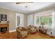 Inviting living room with hardwood floors, classic décor, and natural light at 3315 Mebane Oaks Rd, Mebane, NC 27302