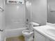 Standard, clean bathroom featuring a shower-tub combo, toilet, and single vanity at 3509 Neptune Dr, Raleigh, NC 27604