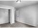 Cozy bedroom with soft carpet flooring and an open closet, offering a tranquil space at 3509 Neptune Dr, Raleigh, NC 27604