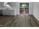 The kitchen seamlessly connects to the outdoor deck and offers modern appliances at 3509 Neptune Dr, Raleigh, NC 27604