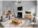 Bright living room with vaulted ceiling, fireplace, and stylish furniture at 3509 Neptune Dr, Raleigh, NC 27604