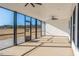 Relaxing screened-in porch with ceiling fans and views of the surrounding landscape at 355 Shaw Rd, Cameron, NC 28326