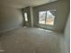 A bedroom with two windows showcasing the home's neutral wall paint and flooring at 40 Commons Cir, Clayton, NC 27520