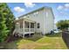 This home has a screened in porch and views of the backyard at 409 Kilcornac Ct, Fuquay Varina, NC 27526