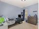 This cozy bedroom features carpeted floors, a ceiling light, and fun decor at 4401 Lyman Ave, Raleigh, NC 27616