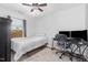 This bedroom is set up as a home office and features a neutral color scheme and ample natural light at 4401 Lyman Ave, Raleigh, NC 27616