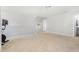This bonus room features an exercise bike and neutral carpet at 4401 Lyman Ave, Raleigh, NC 27616