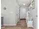 Inviting foyer with wood-look floors and a built-in bench at 4401 Lyman Ave, Raleigh, NC 27616