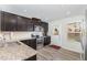 Modern kitchen with stainless steel appliances and granite countertops at 4401 Lyman Ave, Raleigh, NC 27616