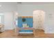 Welcoming entryway featuring a bench, coat rack, and hardwood floors at 470 E Wellesley Dr, Clayton, NC 27520