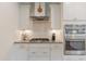 Modern kitchen featuring stainless appliances, backsplash, and a gas range at 470 E Wellesley Dr, Clayton, NC 27520