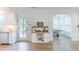 Kitchen showcasing stainless dishwasher, counter space, and seamless flow to breakfast area at 470 E Wellesley Dr, Clayton, NC 27520