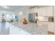 Spacious kitchen showcasing granite counters, stainless appliances, and an open layout at 470 E Wellesley Dr, Clayton, NC 27520