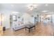 Spacious living room boasts archways, hardwood floors, and an open layout with a view to the kitchen at 470 E Wellesley Dr, Clayton, NC 27520