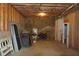 Unfinished basement with exposed wood framing and some storage items at 4810 Glenmist Ct, Raleigh, NC 27612
