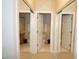 Mirrored view of white doors leading into the Primary bathroom at 4810 Glenmist Ct, Raleigh, NC 27612