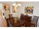 Cozy dining room with chandelier and traditional furniture at 4810 Glenmist Ct, Raleigh, NC 27612