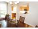 Bright dining room with open view to the kitchen at 4810 Glenmist Ct, Raleigh, NC 27612