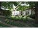 Charming home with lush landscaping and mature trees at 4810 Glenmist Ct, Raleigh, NC 27612