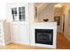 Stylish fireplace with white mantel and built-in shelving at 4810 Glenmist Ct, Raleigh, NC 27612