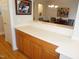 Kitchen countertop leading to view of dining room and hardwood floors at 4810 Glenmist Ct, Raleigh, NC 27612