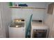 Laundry room with shelving, washer and dryer at 4810 Glenmist Ct, Raleigh, NC 27612