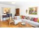 Comfortable living room with neutral tones and a view to the kitchen at 4810 Glenmist Ct, Raleigh, NC 27612