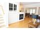 Open-concept living space with fireplace and dining area at 4810 Glenmist Ct, Raleigh, NC 27612