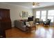 Cozy living room with hardwood floors, neutral decor, and abundant natural light at 4810 Glenmist Ct, Raleigh, NC 27612
