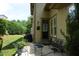 Covered patio featuring a seating area and a door to the house at 4810 Glenmist Ct, Raleigh, NC 27612