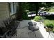Outdoor patio with seating area and view of the street at 4810 Glenmist Ct, Raleigh, NC 27612